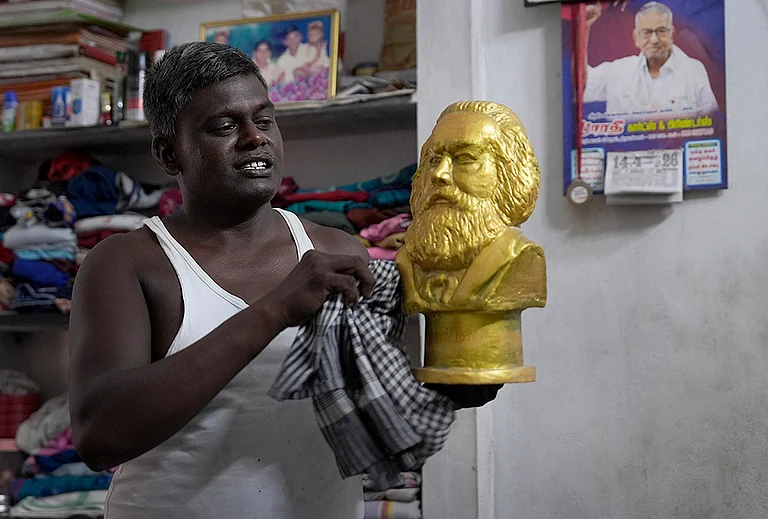 Meet Karl Marx. In this part of the world, he is not the philosopher or economist who altered the course of world history, but a Communist — a construction worker by profession. He lives with his family in a modest one-room house. In a State that prides itself on its Dravidian legacy, Marx, like many others in this village, nurtures a quiet hope: to build a just, classless society — the very ideal that Marxists have long envisioned. “My father was a Communist. He gave me this name, and I carry it with pride.” he says - | Photo: Suresh Pandey/OUTLOOK