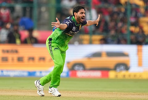 Royal Challengers Bengaluru's Bhuvneshwar Kumar appeals for the wicket of Delhi Capitals' Pathum Nissanka during the Indian Premier League cricket match between Royal Challengers Bengaluru and Delhi Capitals in Bengaluru.