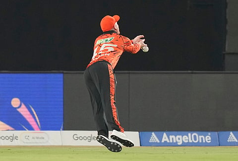Sunrisers Hyderabad's Heinrich Klaasen dives to catch a ball during the Indian Premier League cricket match between Sunrisers Hyderabad and Chennai Super Kings in Hyderabad.
