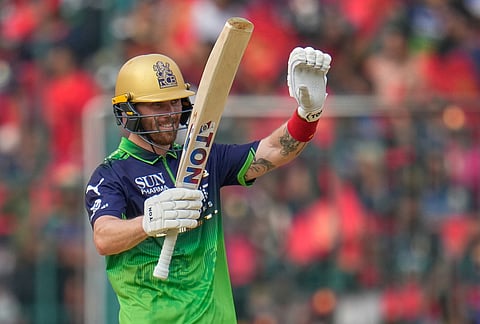 Royal Challengers Bengaluru's Phil Salt celebrates his fifty runs during the Indian Premier League cricket match between Royal Challengers Bengaluru and Delhi Capitals in Bengaluru.