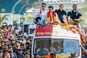 | Photo: PTI : Taking on the Dravidian Majors: Actor-turned-politician Vijay at an election roadshow in Tiruppur on April 14, 2026
