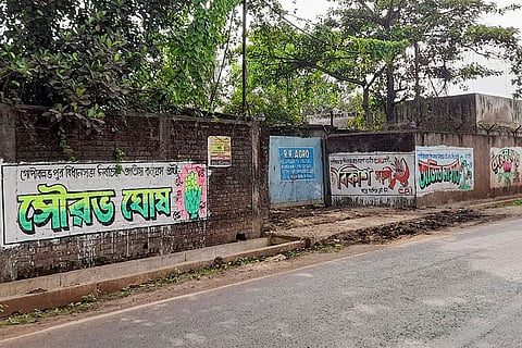 In this image received on April 19, 2026, election graffiti of political parties is seen on a roadside wall in the Gopiballavpur Assembly segment ahead of the West Bengal Assembly elections, in Jhargram, West Bengal.