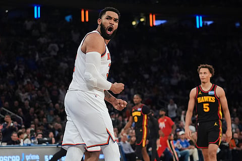 New York Knicks' Karl-Anthony Towns celebrates during the second half in Game 1 of a first-round NBA playoffs basketball series against the Atlanta Hawks  in New York.