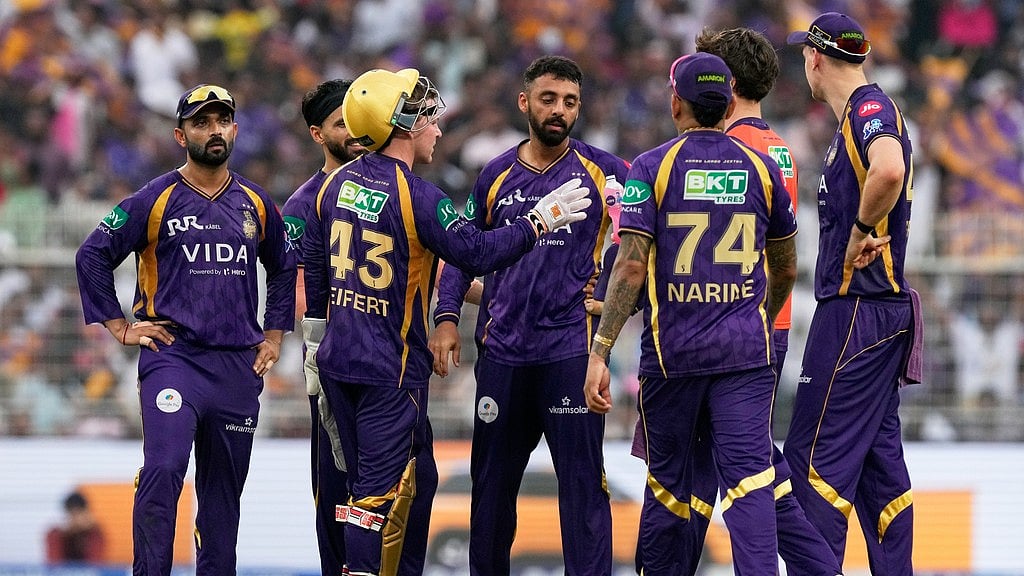 AP/Bikas Das : Kolkata Knight Riders' Varun Chakravarthy, centre, celebrates with teammates the wicket of Rajasthan Royals' captain Riyan Parag during their Indian Premier League match at the Eden Gardens.