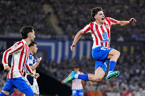 Atletico Madrid's Julian Alvarez celebrates after scoring his side's second goal during the Copa del Rey final soccer match between Atletico Madrid and Real Sociedad in Seville, Spain.