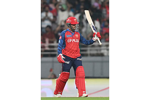 Punjab Kings' Priyansh Arya celebrates his fifty runs during the Indian Premier League cricket match between Punjab Kings and Lucknow Super Giants in New Chandigarh, India.