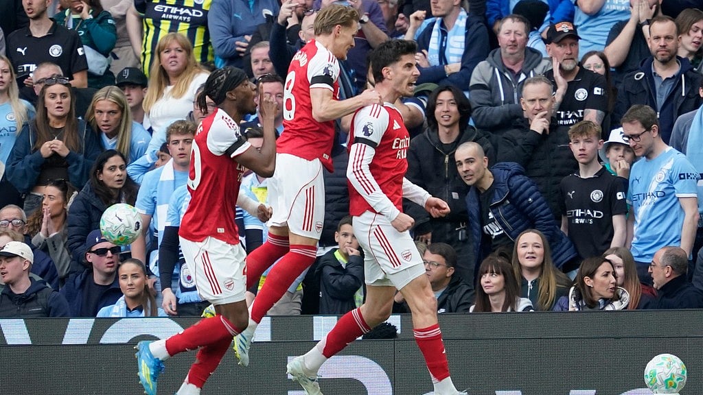 AP/Dave Thompson : Arsenal's Kai Havertz celebrates with his teammates after scoring his side's first goal during the English Premier League match against Manchester City.