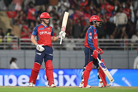 Punjab Kings' Cooper Connolly, left, celebrates his fifty runs as his batting partner Priyansh Arya looks on during the Indian Premier League cricket match between Punjab Kings and Lucknow Super Giants in New Chandigarh, India.