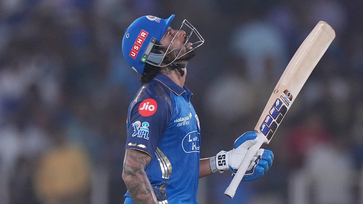 Tilak Varma celebrates after scoring half-century in GT vs MI IPL 2026 match at Narendra Modi Stadium in Ahmedabad.  - | Photo: AP