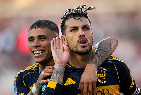 Boca Juniors' Leandro Paredes celebrates scoring from the penalty spot his side's opening goal against River Plate during an Argentine soccer league match in Buenos Aires, Argentina.