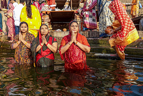 Women take a holy dip in the Ganga river on the occasion of 'Akshaya Tritiya', in Varanasi, Uttar Pradesh.
