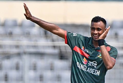 Bangladesh's Shoriful Islam celebrates the wicket of New Zealand's Nick Kelly during the second one day international cricket match between Bangladesh and New Zealand in Mirpur, Bangladesh.