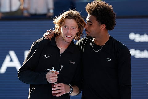 France's Arthur Fils, right, talks after defeatingg Russia's Andrey Rublev at the end of ATP Barcelona Open tennis final in Barcelona, Spain.