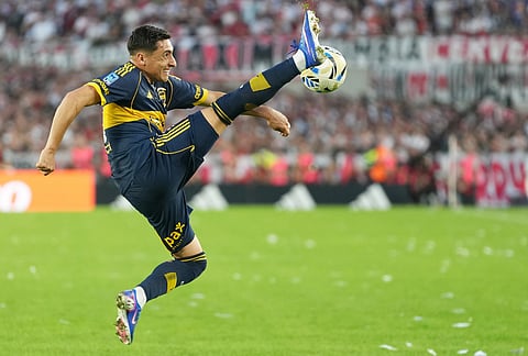 Boca Juniors' Miguel Merentiel controls the ball during an Argentine soccer league match against River Plate in Buenos Aires, Argentina.