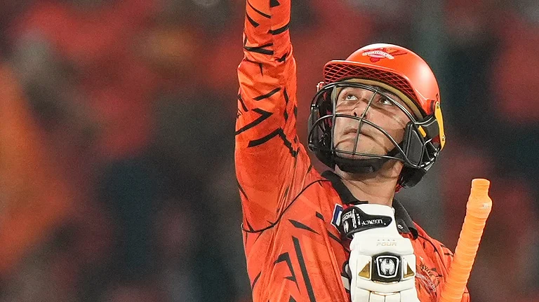 Abhishek Sharma celebrates his century against Delhi Capitals during IPL 2026 clash at Hyderabad. - AP Photo