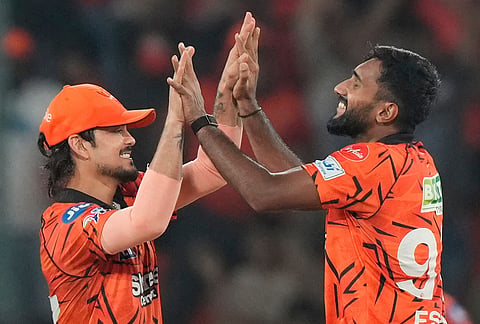Sunrisers Hyderabad's Eshan Malinga, right, and Sunrisers Hyderabad's captain Ishan Kishan celebrates the wicket of Delhi Capitals' Nitish Rana during the Indian Premier League cricket match between Sunrisers Hyderabad and Delhi Capitals in Hyderabad.