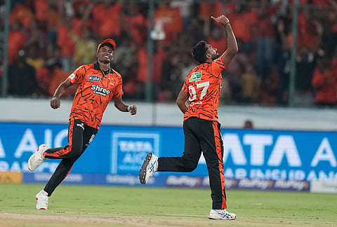 Sunrisers Hyderabad's Eshan Malinga, right, celebrates the wicket of Delhi Capitals' David Miller during the Indian Premier League cricket match between Sunrisers Hyderabad and Delhi Capitals in Hyderabad.