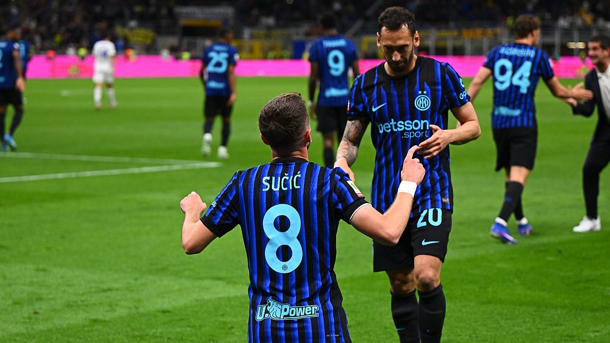 Hakan Calhanoglu and Petar Sucic celebrate as Inter Milan complete comeback victory for Como in Coppa Italia 2025-26 semi final at San Siro.  - Inter/X