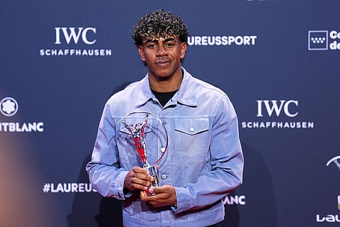 Lamine Yamal poses with Laureus World Young Sportsperson of the Year Award during the 2026 Laureus World Sports Awards ceremony in Madrid, Spain.
