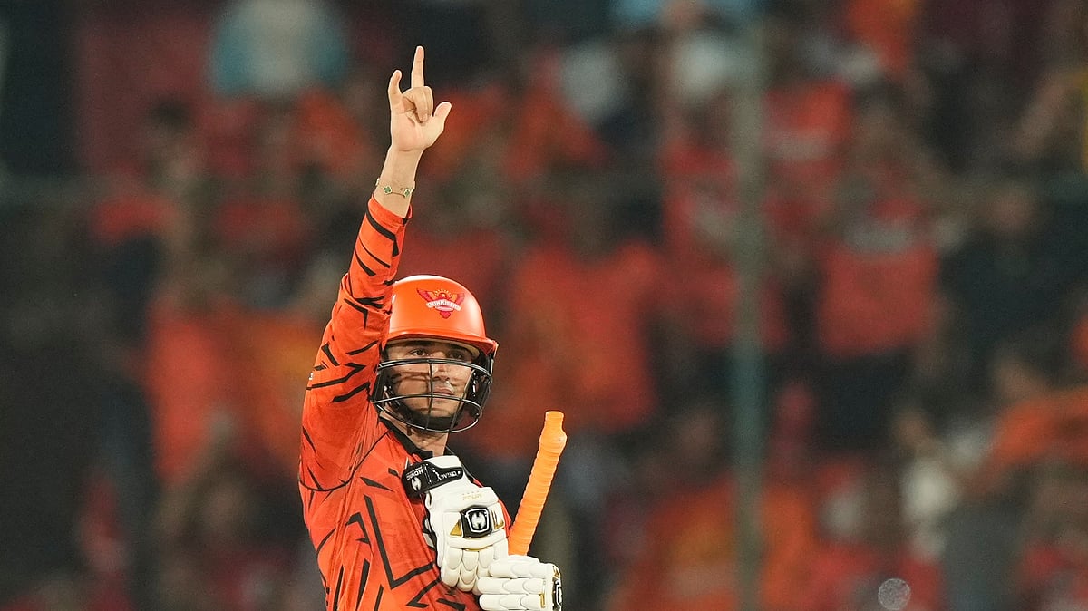 Sunrisers Hyderabad's Abhishek Sharma celebrates his century during the Indian Premier League cricket match between Sunrisers Hyderabad and Delhi Capitals in Hyderabad, India, Tuesday, April 21, 2026. - (AP Photo/Mahesh Kumar A.)