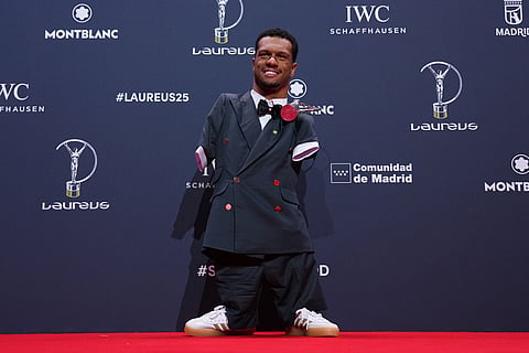 Brazilian Paralympic swimmer Gabriel Araujo poses with his Laureus World Sportsperson of the Year with a Disability award during the 2026 Laureus World Sports Awards ceremony in Madrid, Spain.