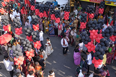 DMK supporters during MK Stalin's roadshow ahead of the Tamil Nadu Assembly elections.