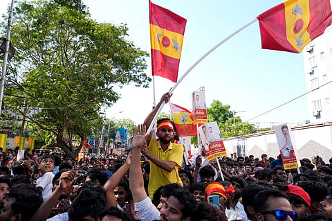 Tamilaga Vettri Kazhagam (TVK) supporters gather during a roadshow ahead of the Tamil Nadu Assembly elections.