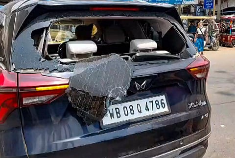 A damaged vehicle allegedly belonging to Indian Secular Front candidate Arabul Islam after an alleged attack on his convoy, in South 24 Parganas district.