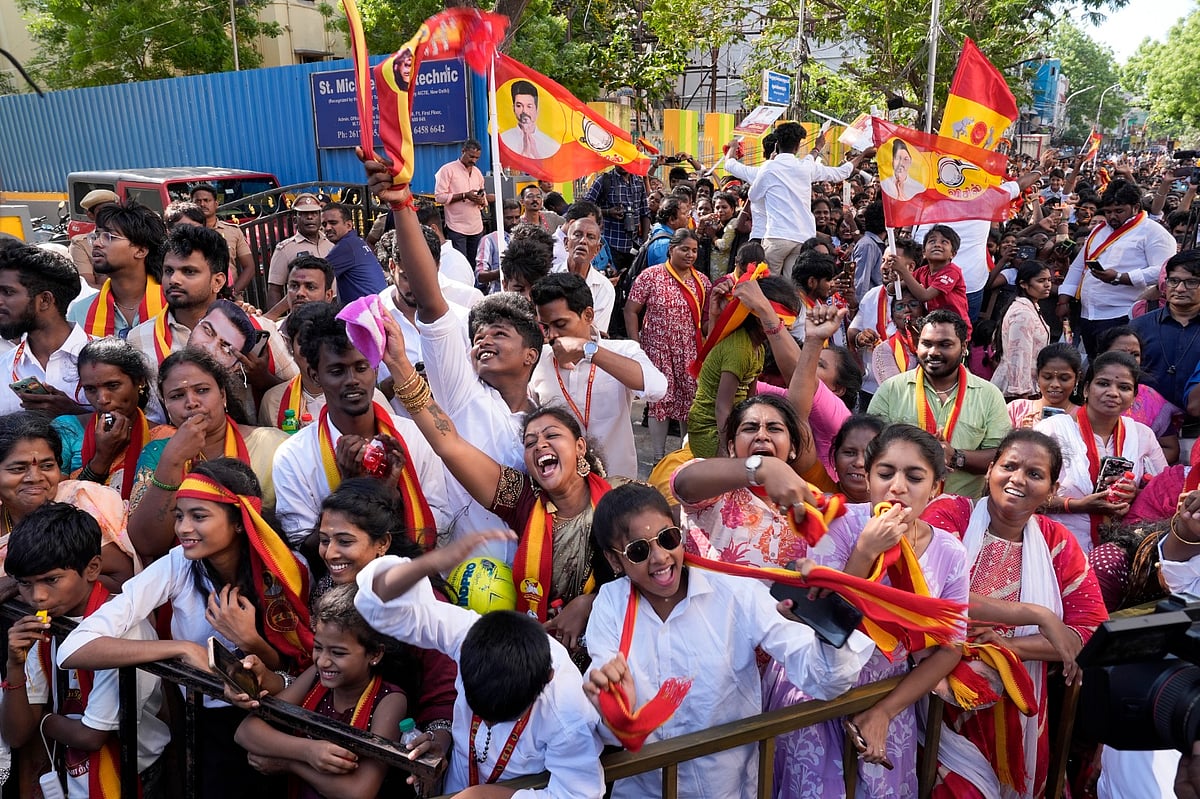 TVK supporters gather during a roadshow led by party chief and candidate from the Tiruchirappalli East constituency, Vijay, ahead of the Tamil Nadu Assembly elections.  - | Photo: Suresh K Pandey/OUTLOOK