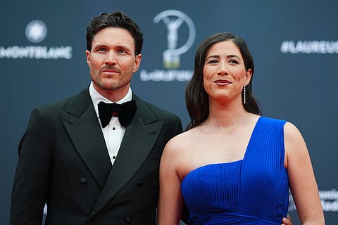 Spanish former tennis player Garbine Muguruza, right, poses as she arrives for the 2026 Laureus World Sports Awards ceremony in Madrid, Spain.