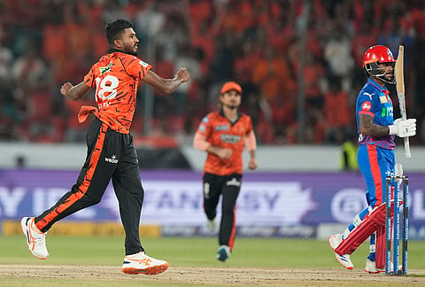 Sunrisers Hyderabad's Dilshan Madushanka, left, celebrates the wicket of Delhi Capitals' Pathum Nissanka, right, during the Indian Premier League cricket match between Sunrisers Hyderabad and Delhi Capitals in Hyderabad.