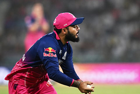 Rajasthan Royals' captain Riyan Parag takes the catch to dismiss Lucknow Super Giants' Mitchell Marsh during the Indian Premier League cricket match between Lucknow Super Giants and Rajasthan Royals in Lucknow.