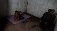 One Year After Pahalgam: No Bunkers, Lingering Trauma In Border Areas Photo: Getty Images : People of Charunda village sit inside a bunker in Uri, Jammu and Kashmir, India, on April 28, 2025. Fear resurfaces in border villages along the Line of Control (LoC) following two consecutive nights of unprovoked small arms firing by Pakistan. Multiple Indian Army posts across the Kashmir sector are targeted, and Indian troops respond firmly as tensions escalate between the neighbors following the Pahalgam terror attacks.