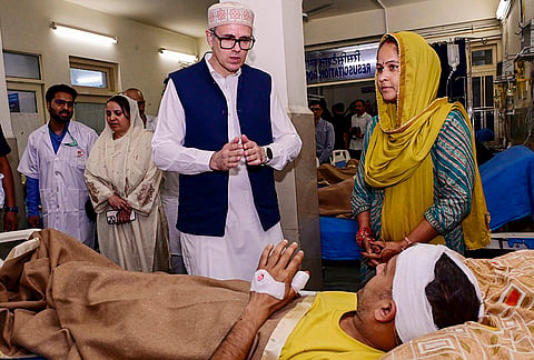 Jammu and Kashmir Chief Minister Omar Abdullah meets victims of the recent bus crash during a visit to the Government Medical College (GMC), in Udhampur. At least 21 people were killed and 51 others injured when an overcrowded passenger bus plunged nearly 100 metres down a hillside in Ramnagar area of Udhampur district on April 20. 