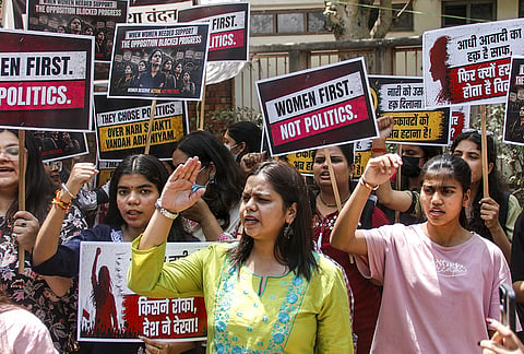 Students of Delhi University (DU) stage a protest over 'Nari Shakti Vandan Adhiniyam', commonly known as Women's Reservation Act, at Art Faculty, in New Delhi.