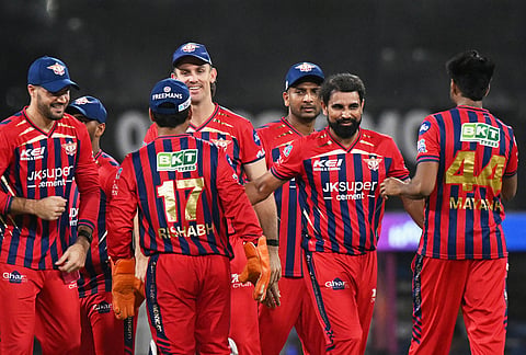 Lucknow Super Giants' Mohammed Shami, second right, celebrates with teammates the wicket of Rajasthan Royals' Dhruv Jurel during the Indian Premier League cricket match between Lucknow Super Giants and Rajasthan Royals in Lucknow.