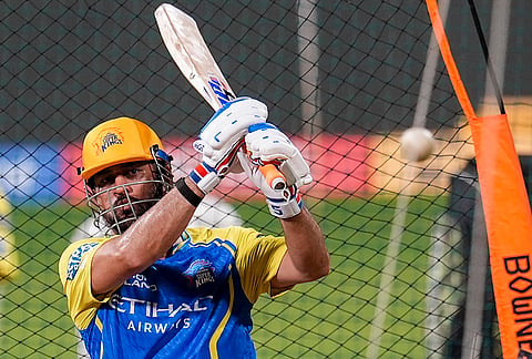 Chennai Super Kings' MS Dhoni plays a shot during a practice session ahead of the Indian Premier League (IPL) 2026 T20 cricket match between Mumbai Indians and Chennai Super Kings, in Mumbai.