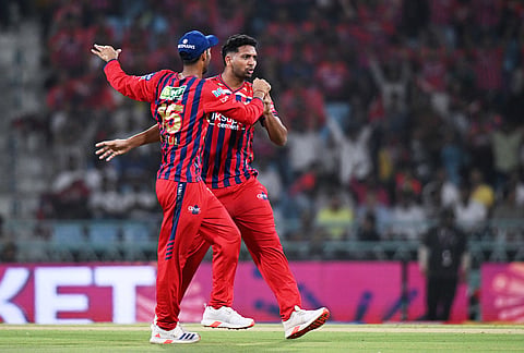 Lucknow Super Giants' Mohsin Khan, right, celebrates with teammate Mukul Choudhary the wicket of Rajasthan Royals' Vaibhav Sooryavanshi during the Indian Premier League cricket match between Lucknow Super Giants and Rajasthan Royals in Lucknow.