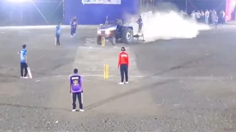 Screengrab of a video showing the tractor vandalising the pitch in Maharashtra's Jalgaon district. - null