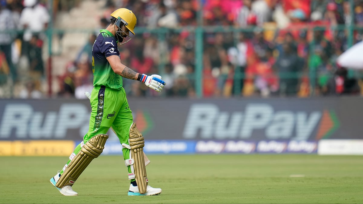 Royal Challengers Bengaluru's Virat Kohli walks off the filed after losing his wicket during the Indian Premier League cricket match between Royal Challengers Bengaluru and Delhi Capitals in Bengaluru, India, Saturday, April 18, 2026. - | Photo: AP/Aijaz Rahi