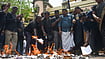 Source:  IMAGO / ANI News : DMK Supporters Burn Copies of 131st Amendment and Delimitation Bills in Chennai Chennai, Apr 16 (ANI): DMK supporters stage a protest by burning the copy of the Constitution (131st Amendment) Bill 2026 and the proposed Delimitation Bill, alleged to reduce Tamil Nadu's parliamentary representation, at the party s headquarters in Chennai

