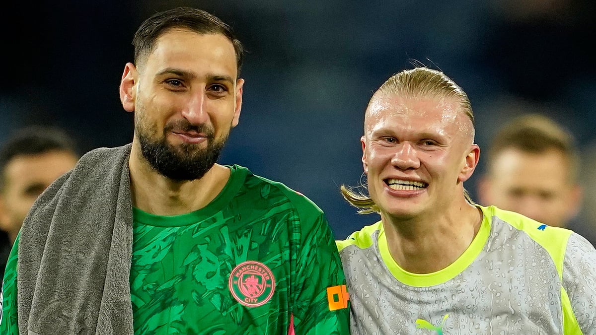 Manchester City's goalkeeper Gianluigi Donnarumma, left, and Erling Haaland walk off the pitch. - AP/Dave Thompson