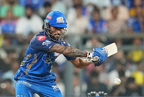 Mumbai Indians' Tilak Varma plays a shot during the Indian Premier League cricket match between Mumbai Indians and Chennai Super Kings in Mumbai.