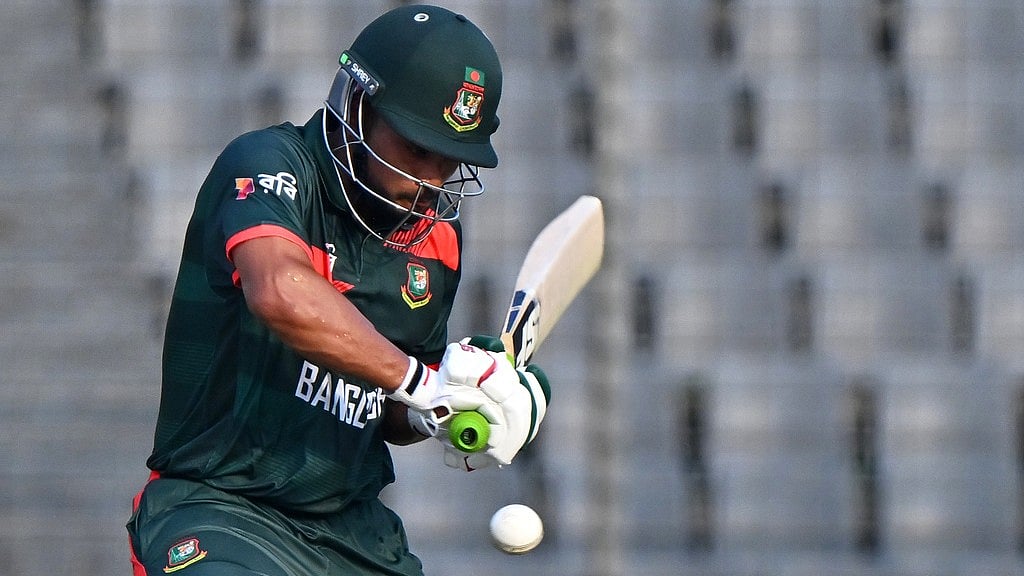 AP/Mosaraf Hossain : Najmul Hossain Shanto plays a shot during the second one-day international between Bangladesh and New Zealand in Mirpur.