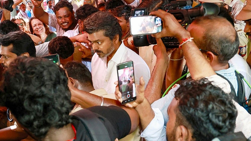 Tamilaga Vettri Kazhagam (TVK) chief and candidate from the Tiruchirappalli East constituency, Vijay, casts a vote in the Tamil Nadu Assembly elections at a polling station in Chennai. - | Photo: PTI