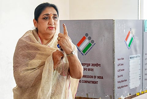 Maharashtra Deputy Chief Minister and NCP leader Sunetra Pawar shows her inked finger after casting a vote in the Baramati Assembly bypoll, in Pune district.
