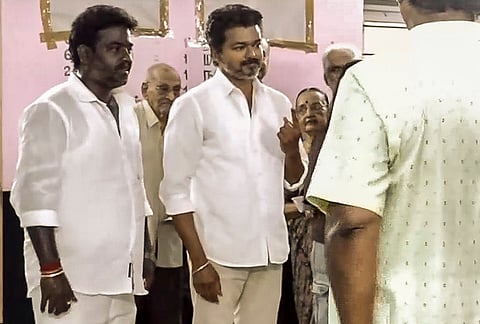 Tamilaga Vettri Kazhagam (TVK) chief and candidate from the Tiruchirappalli East constituency, Vijay, casts a vote in the Tamil Nadu Assembly elections at a polling station in Chennai.