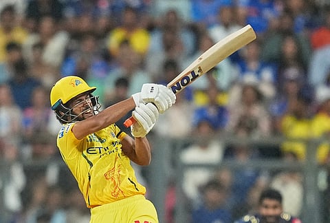 Chennai Super Kings' captain Ruturaj Gaikwad hits a six uring the Indian Premier League cricket match between Mumbai Indians and Chennai Super Kings in Mumbai.