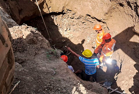 SDRF and NDRF personnel carry out a rescue operation after a man allegedly fell into a borewell pit while digging for a handpump at Kangri village, in Haridwar.