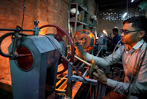 The flame workers, who form a large chunk of the unorganised sector, use flames fuelled by oxygen and LPG to melt and shape glass rods at high temperatures—the technique of manipulating molten glass directly in the flame enables the creation of intricate items like jewellery beads, small sculptures, decorative pieces, bangles and marbles